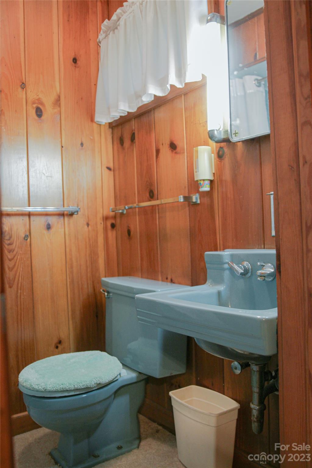 35 Rhododendron Avenue Spruce Pine, NC 28777 - Photo 24 of 37 a bathroom with a sink a toilet and shower