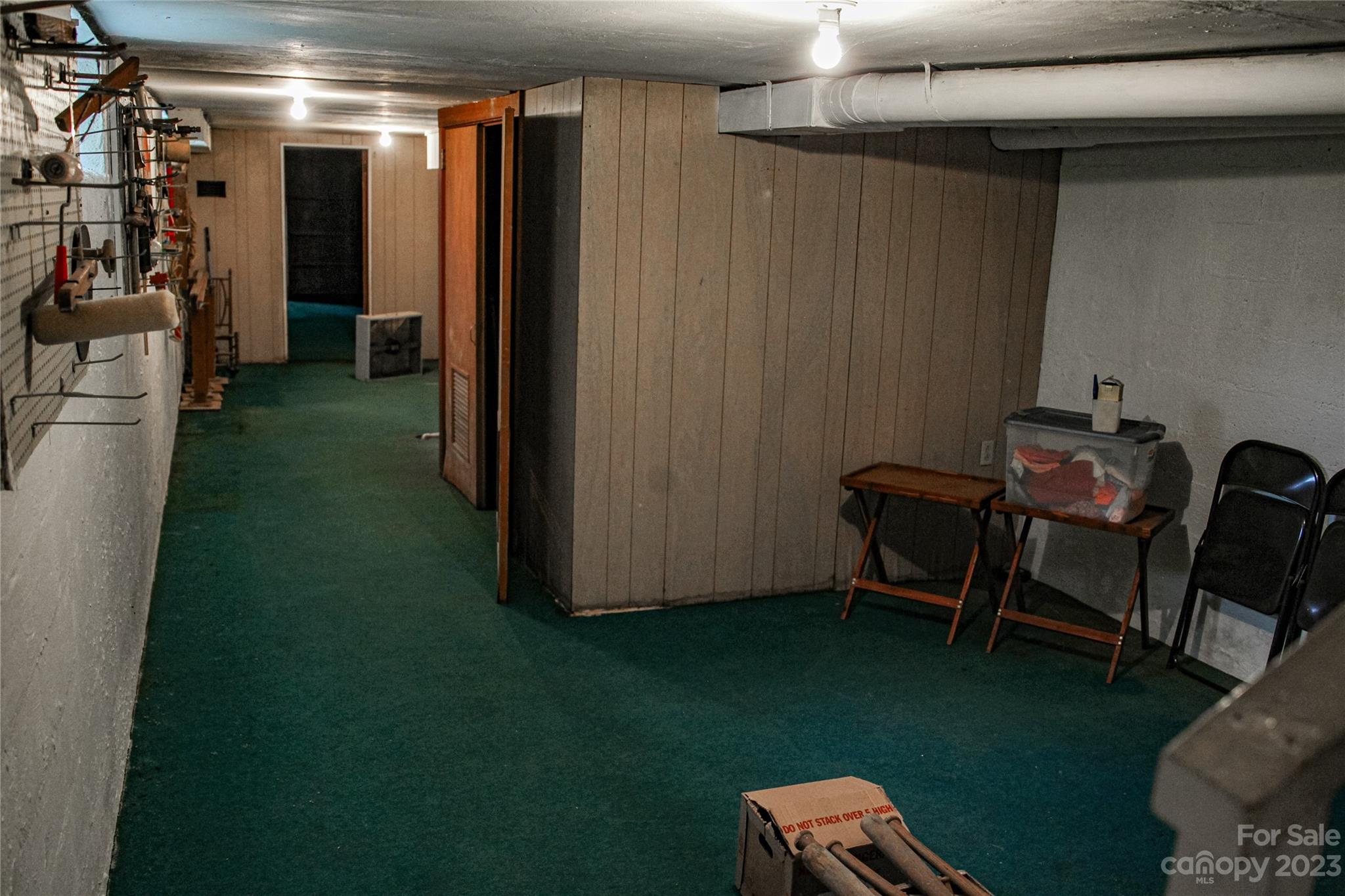 35 Rhododendron Avenue Spruce Pine, NC 28777 - Photo 28 of 37 a view of a room with chairs and closet