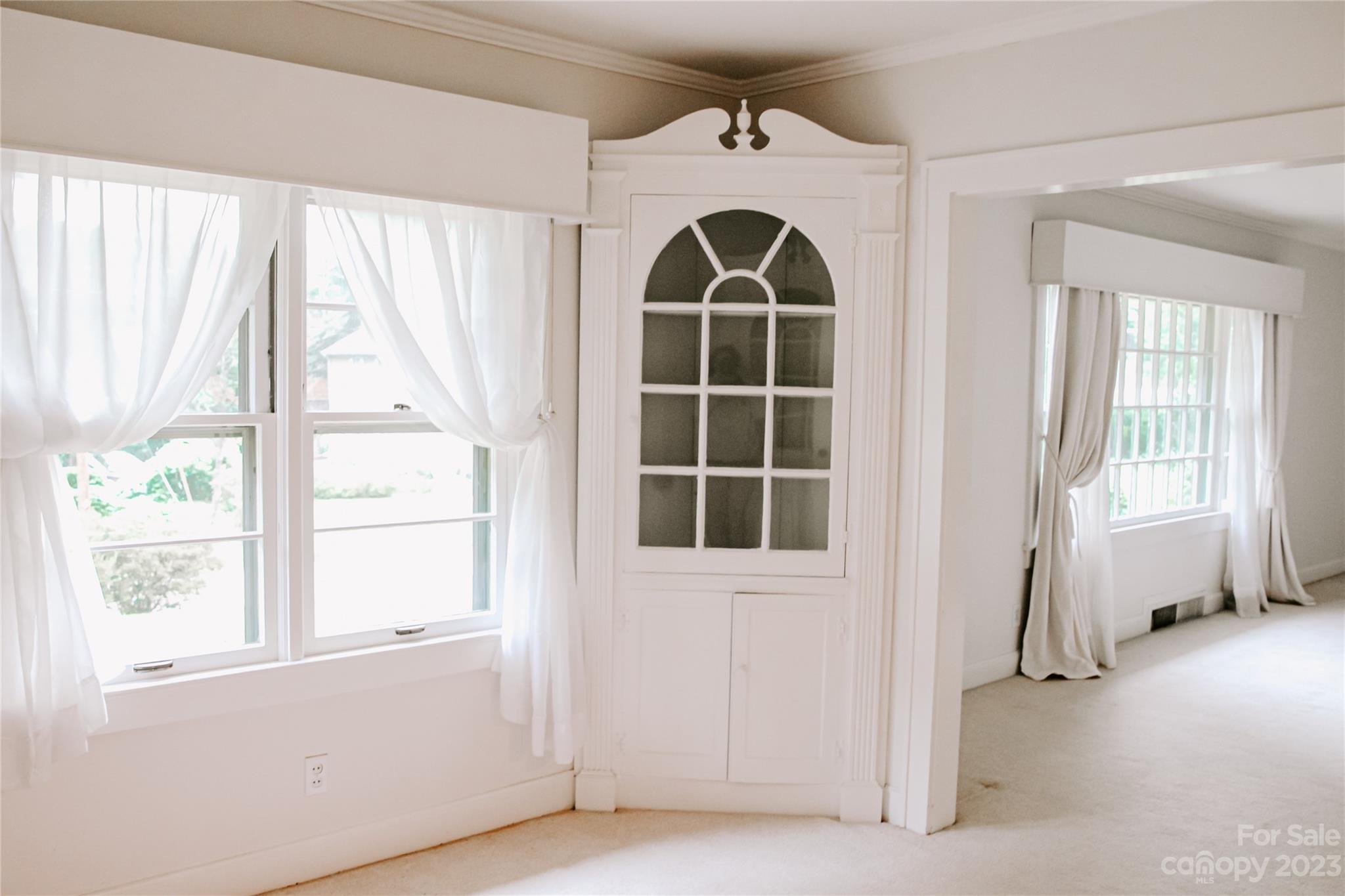 35 Rhododendron Avenue Spruce Pine, NC 28777 - Photo 8 of 37 an empty room with windows