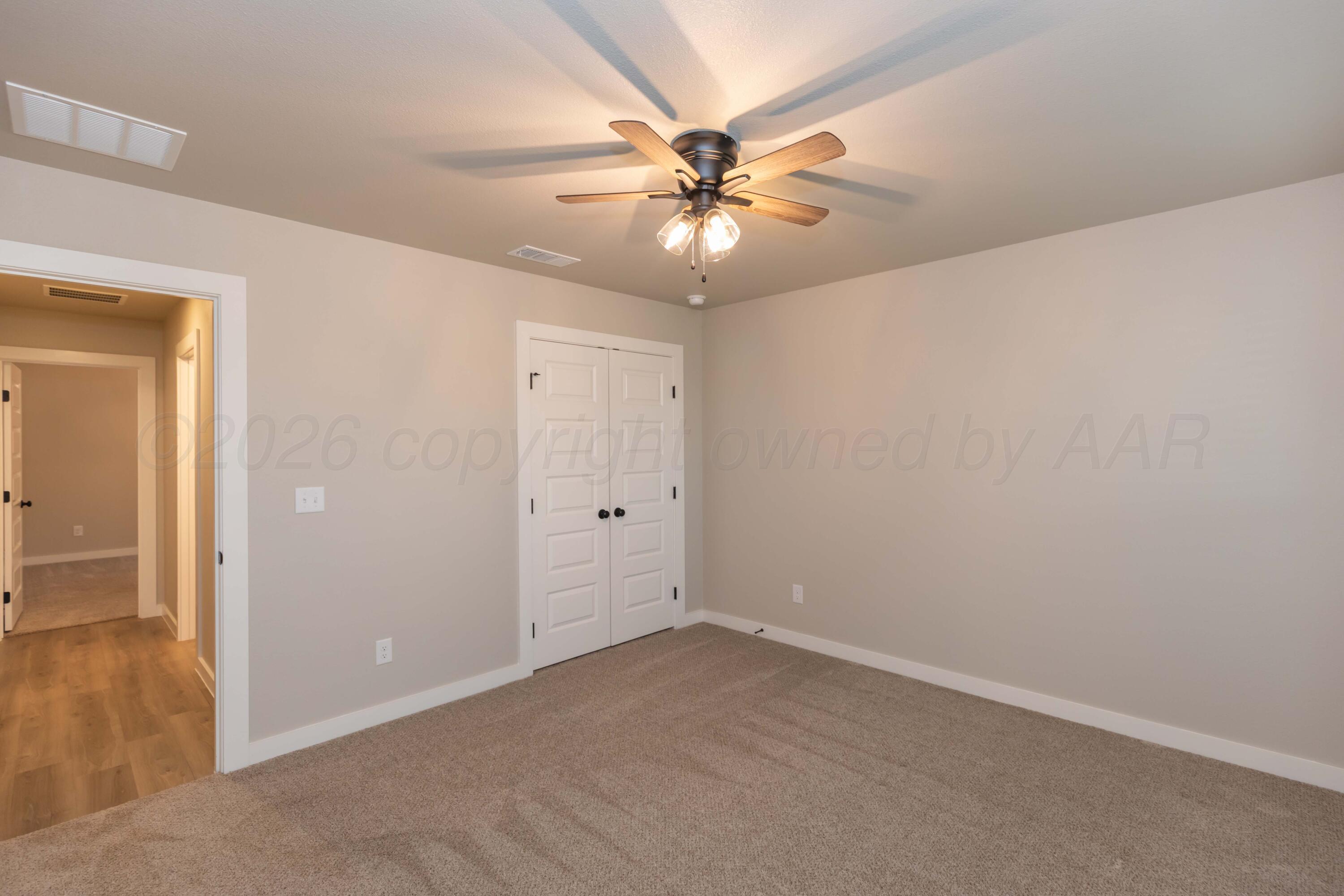 1807 Moon River Road Amarillo, TX 79118 - Photo 17 of 37 wooden floor in an empty room