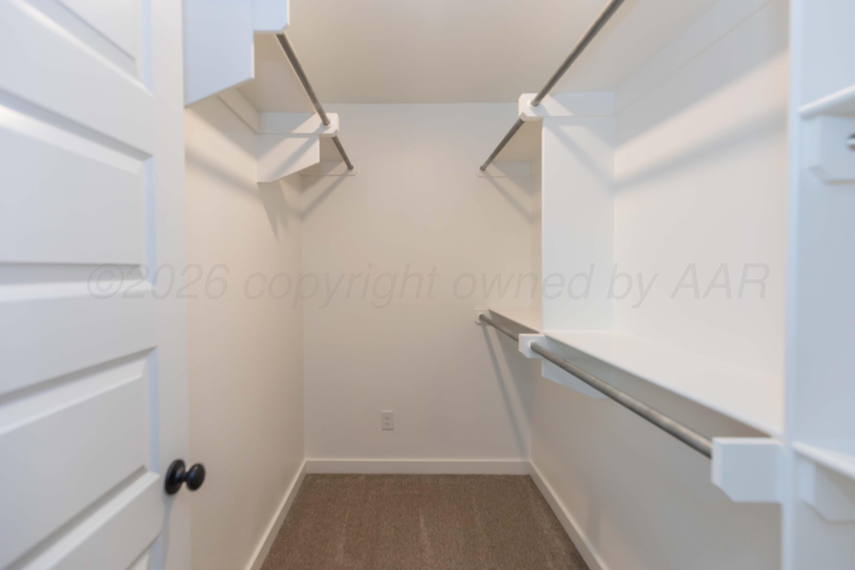 1807 Moon River Road Amarillo, TX 79118 - Photo 32 of 37 a view of walk in closet