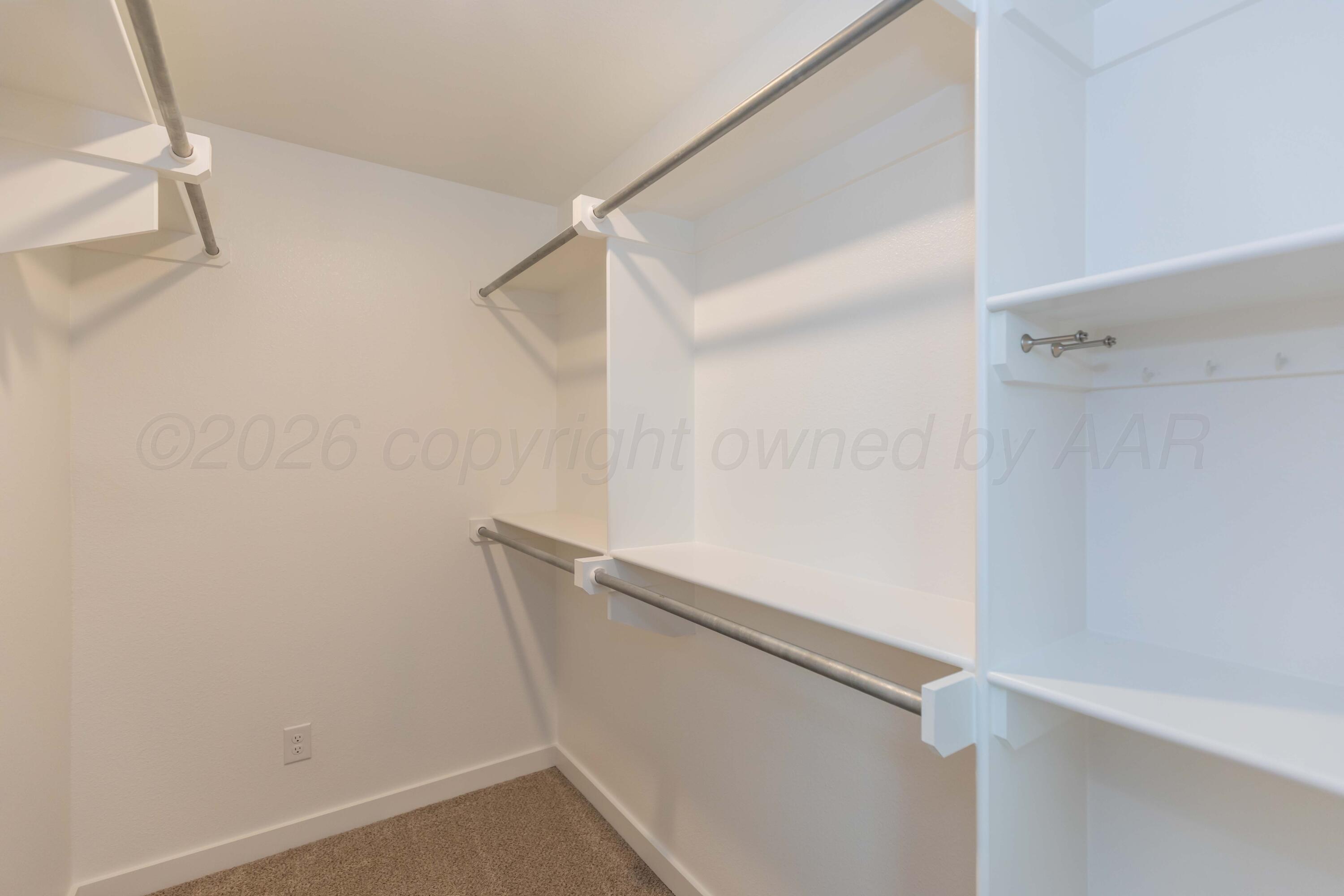 1807 Moon River Road Amarillo, TX 79118 - Photo 33 of 37 a view of walk in closet