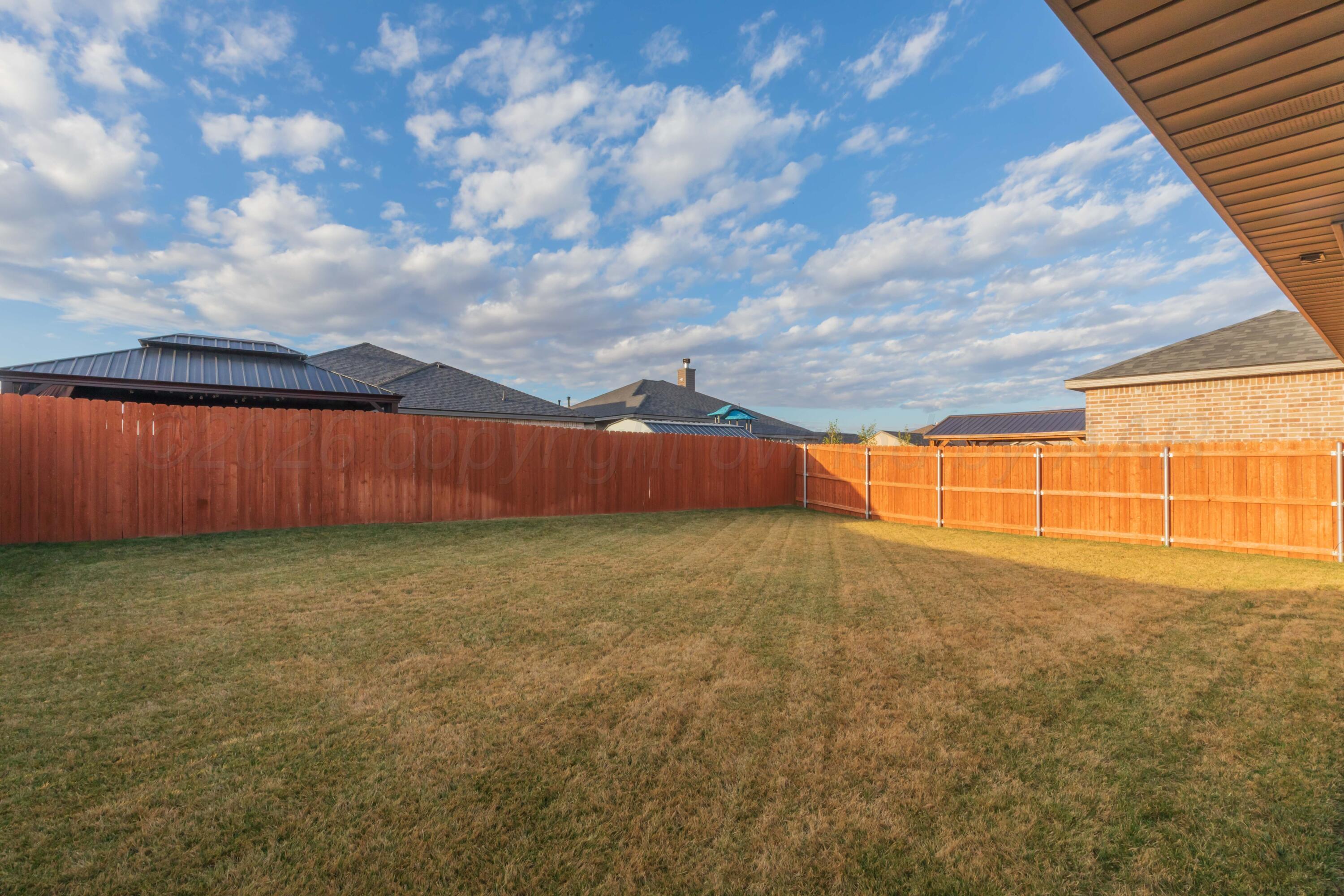 1807 Moon River Road Amarillo, TX 79118 - Photo 37 of 37 a view of a backyard