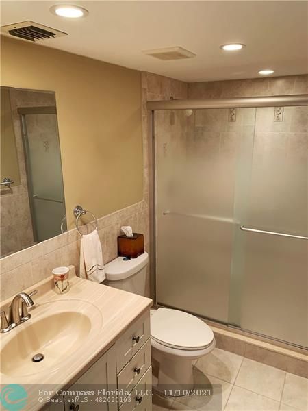 Kings Point Delray Beach, FL 33484 - Photo 12 of 20 a bathroom with a sink toilet and shower