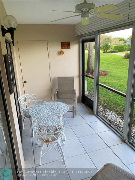 Kings Point Delray Beach, FL 33484 - Photo 19 of 20 a living room with a outdoor seating space