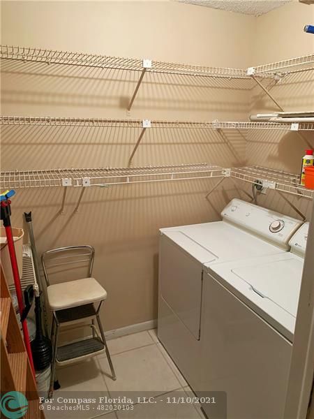 Kings Point Delray Beach, FL 33484 - Photo 20 of 20 a utility room with dryer and washer