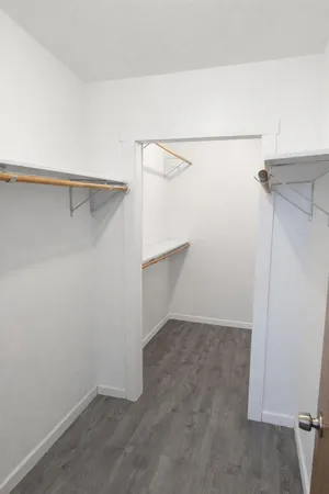 a view of a room with racks on the wall