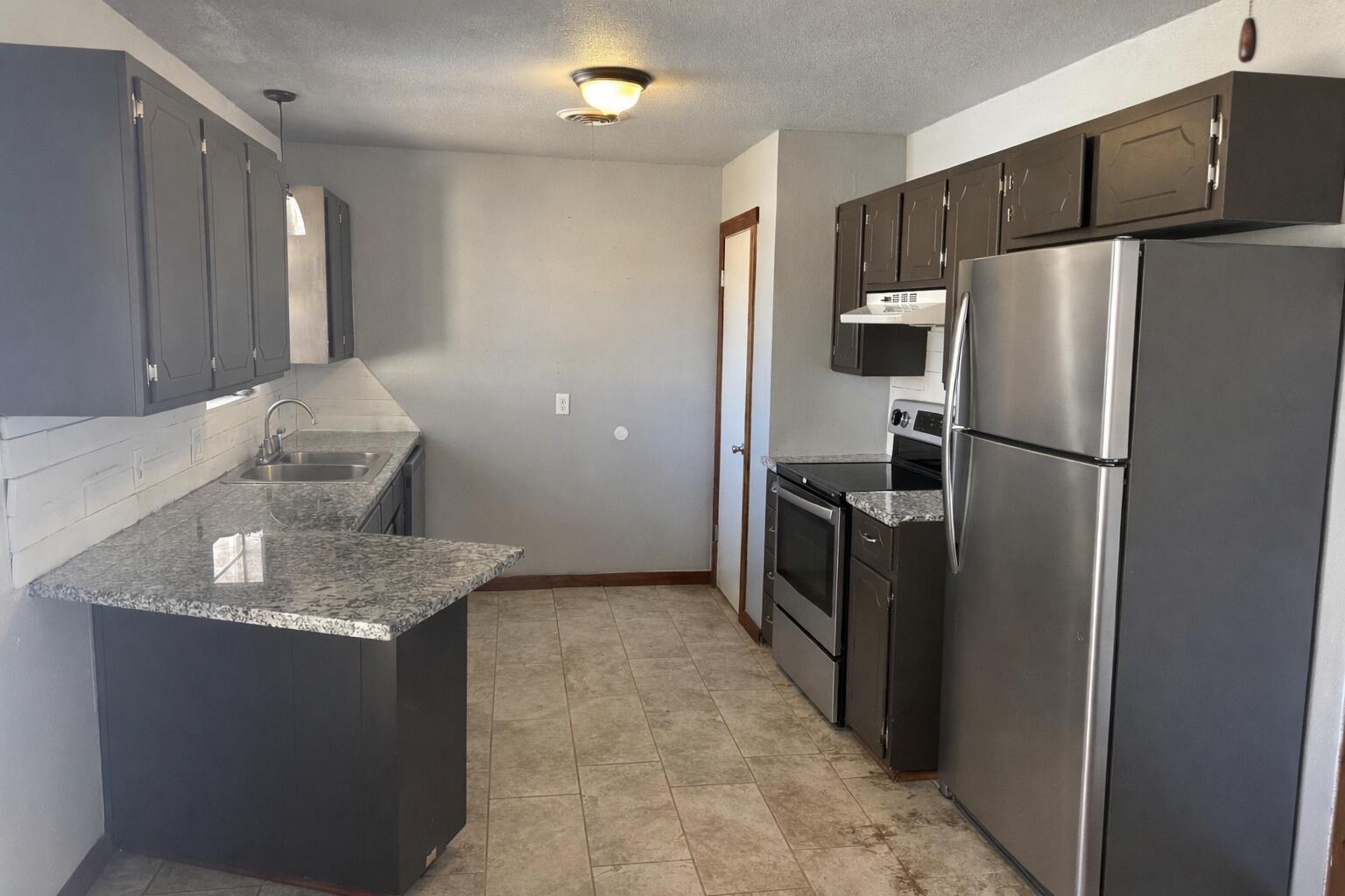 1415 Holliday Plainview, TX 79072 - Photo 6 of 12 543E7E8C-7AAD-478A-B630-61F3D8B8F76D