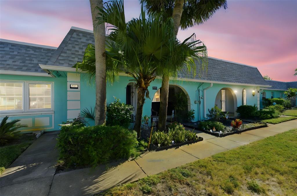 4218 Terrapin Place, Unit D New Port Richey, FL 34652 - Photo 8 of 34 front view of a house with a yard