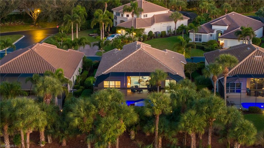 10071 St Moritz Drive Miromar Lakes, FL 33913 - Photo 26 of 45 an aerial view of a house
