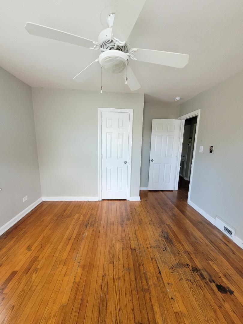 2309 East Main Street Durham, NC 27703 - Photo 12 of 30 wooden floor in an empty room with a window
