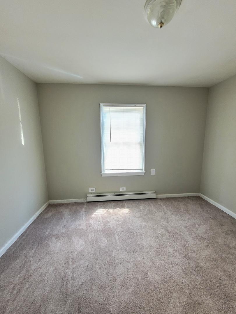 2309 East Main Street Durham, NC 27703 - Photo 17 of 30 an empty room with a window