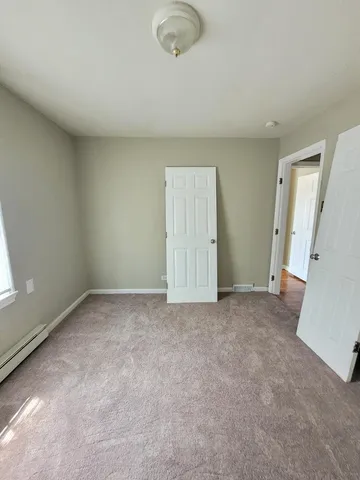 an empty room with a natural light