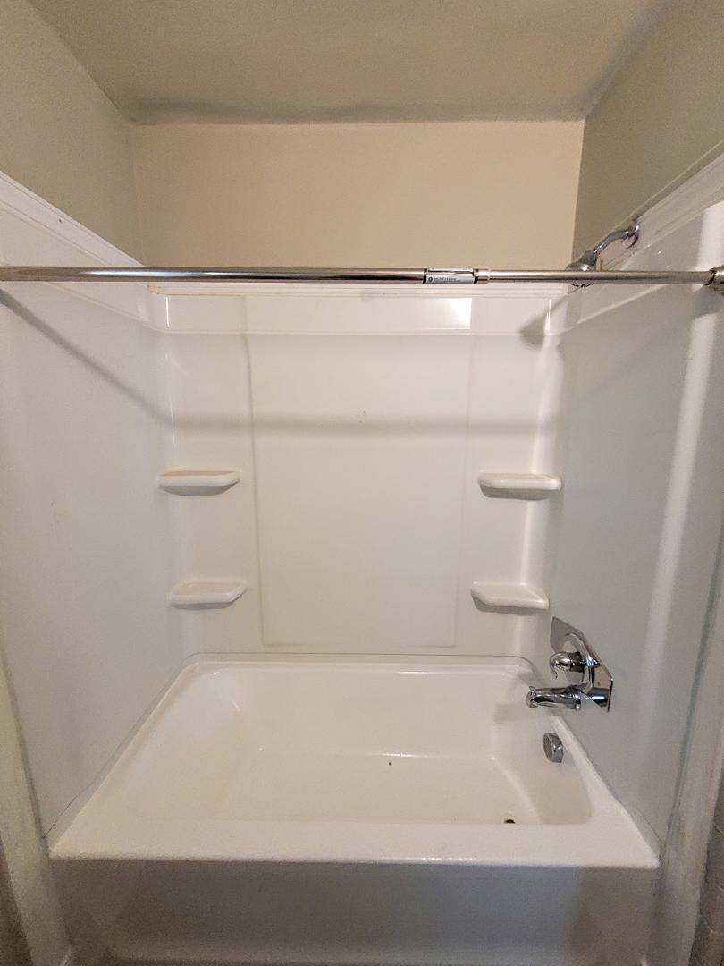 2309 East Main Street Durham, NC 27703 - Photo 21 of 30 a bathroom with a bathtub