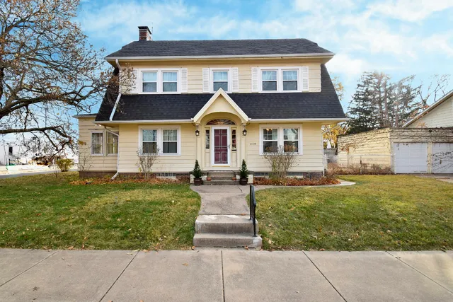 front view of a house with a yard