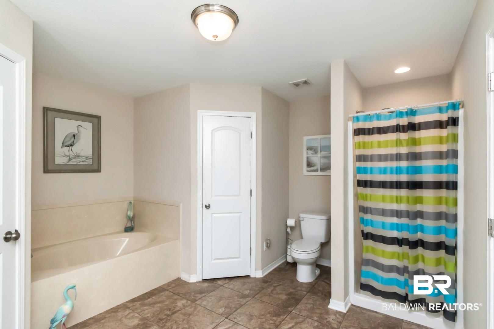 11528 Mocking Bird Lane Fairhope, AL 36532 - Photo 20 of 45 Bathroom featuring a stall shower, a garden tub, and recessed lighting