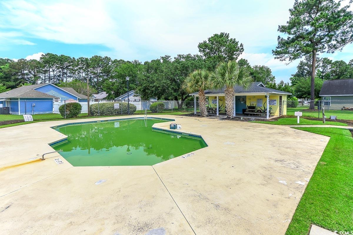 9664 Middleton Court Murrells Inlet, SC 29576 - Photo 23 of 28 Community pool with a patio and view of scattered