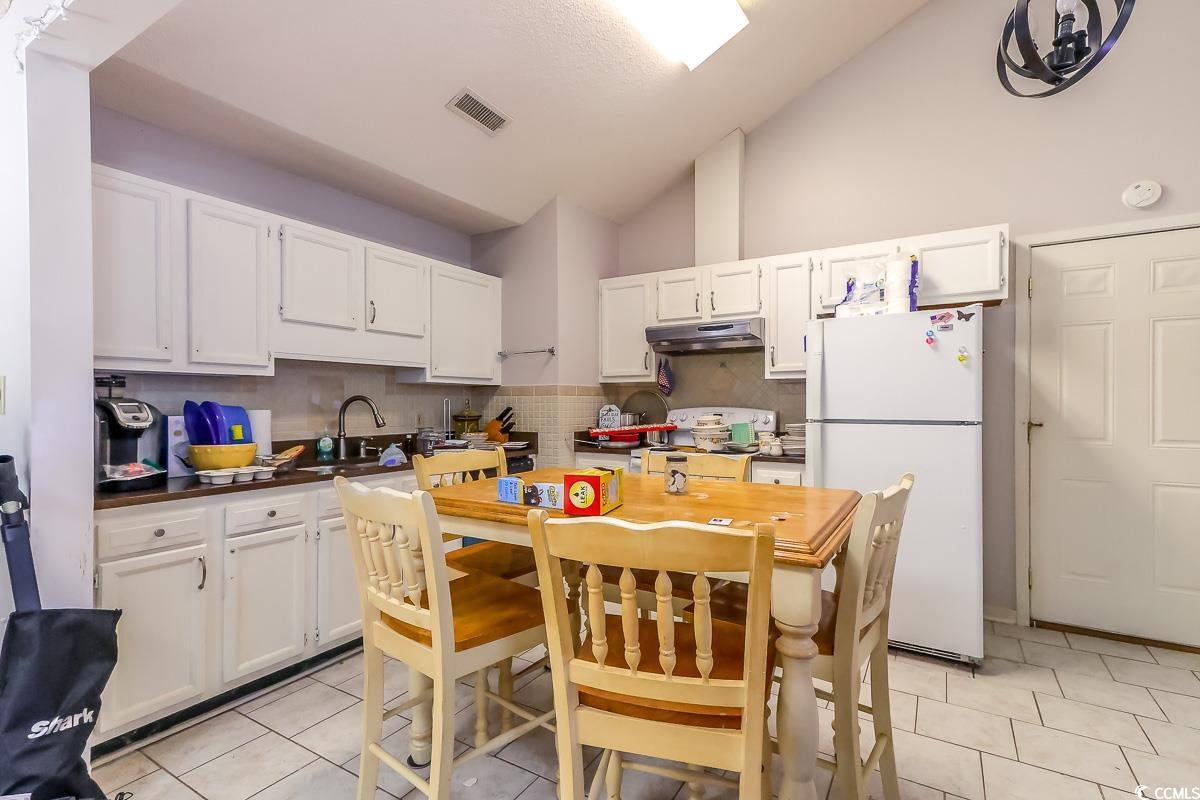 9664 Middleton Court Murrells Inlet, SC 29576 - Photo 6 of 28 Kitchen featuring freestanding refrigerator, under
