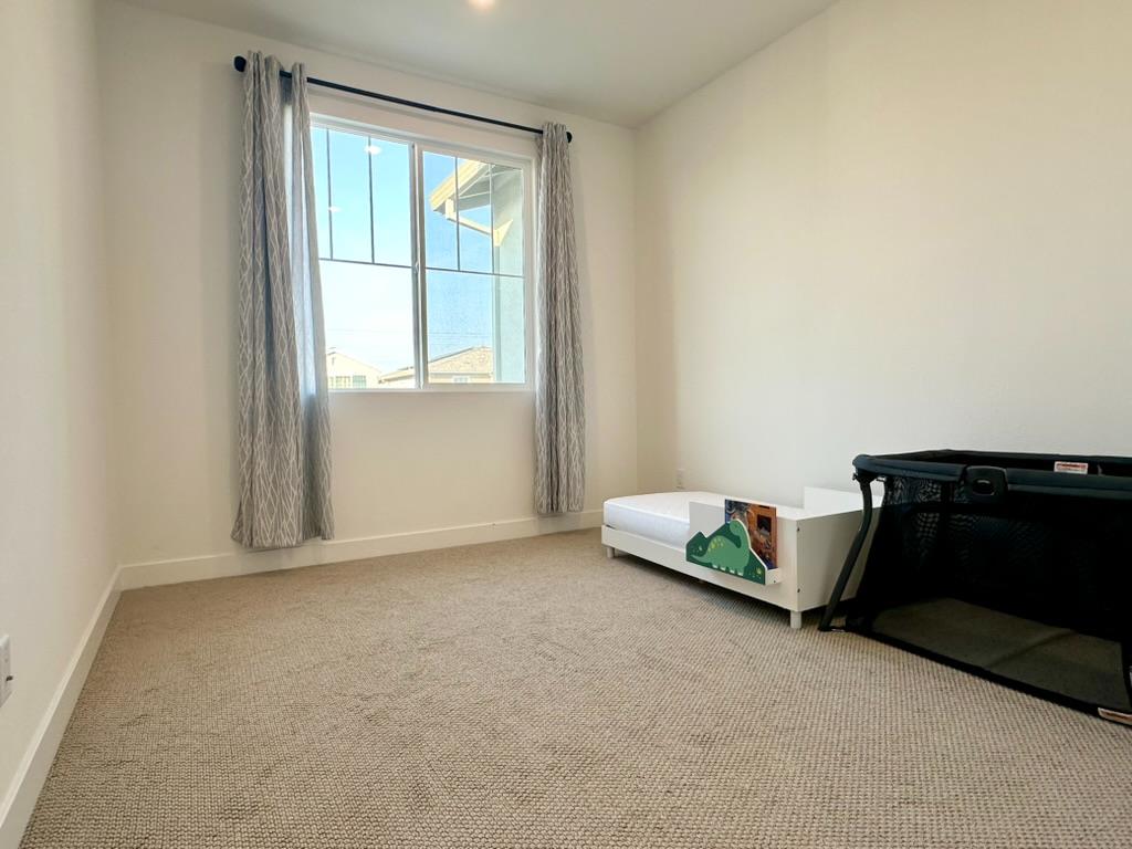 1770 Flaxen Court Manteca, CA 95337 - Photo 15 of 27 First bedroom on the right in the upper floor