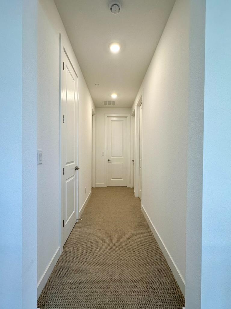 1770 Flaxen Court Manteca, CA 95337 - Photo 20 of 27 Upper floor hallway