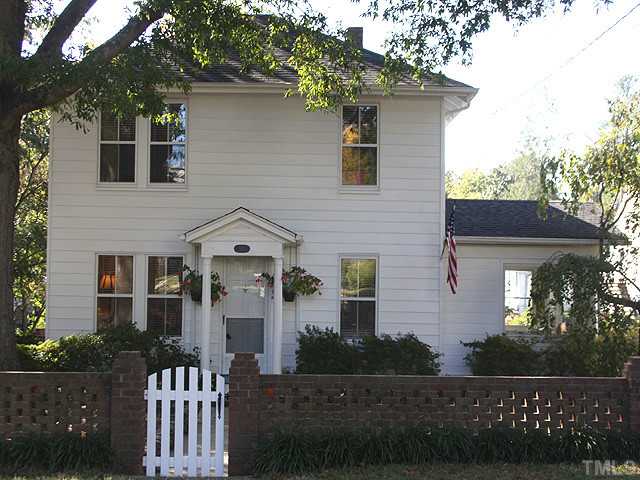 502 Harding Street Raleigh, NC 27604 - Photo 2 of 25 a front view of a house with a garden