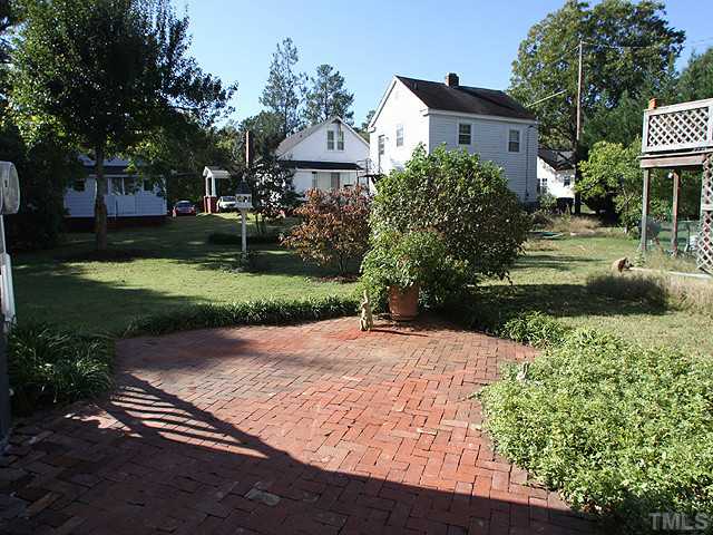 502 Harding Street Raleigh, NC 27604 - Photo 22 of 25 a front view of a house with a yard