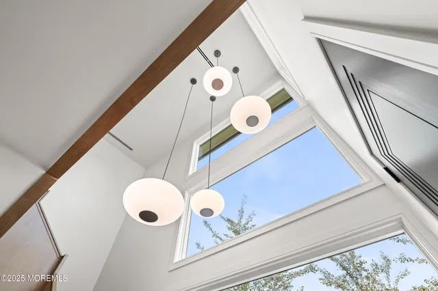 a view of a door and chair in a balcony