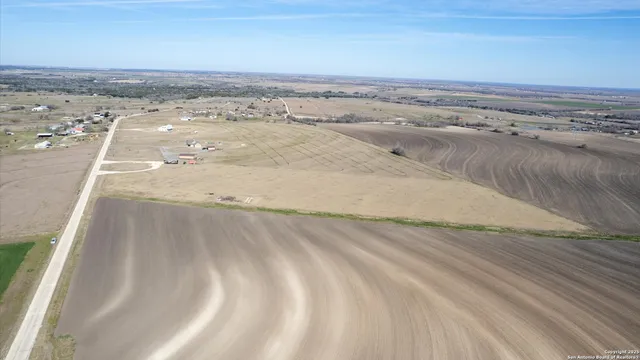 an aerial view of beach and ocean