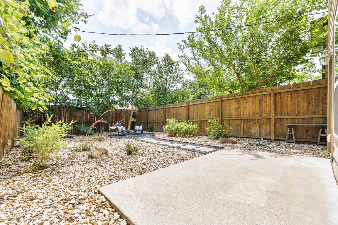 3407 Banton Road, Unit A Austin, TX 78722 - Photo 24 of 39 Fenced backyard with a patio