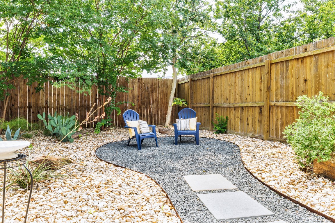 3407 Banton Road, Unit A Austin, TX 78722 - Photo 25 of 39 Fenced backyard with a patio
