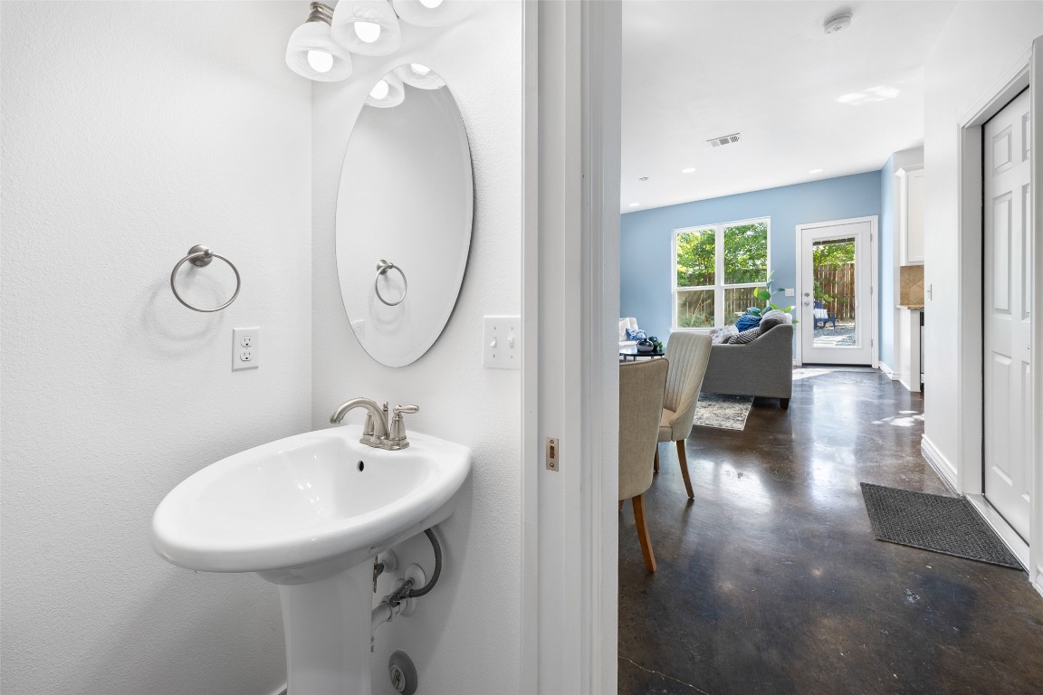 3407 Banton Road, Unit A Austin, TX 78722 - Photo 27 of 39 Bathroom featuring concrete flooring and baseboards