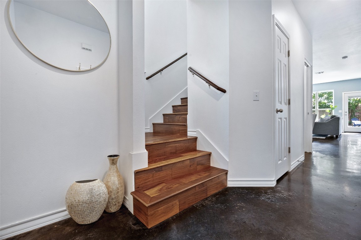 3407 Banton Road, Unit A Austin, TX 78722 - Photo 4 of 39 Staircase featuring concrete floors and baseboards