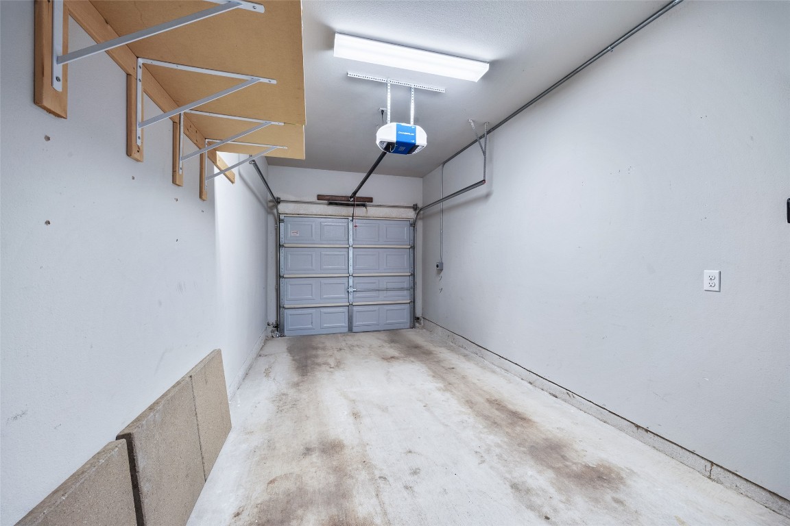 3407 Banton Road, Unit A Austin, TX 78722 - Photo 10 of 39 Garage featuring a garage door opener