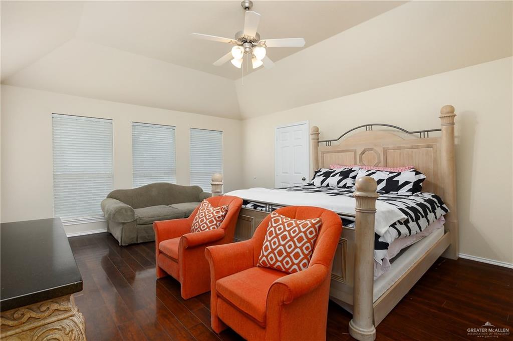 3400 San Angelo Street Mission, TX 78572 - Photo 7 of 12 a bed room with bed and a couch