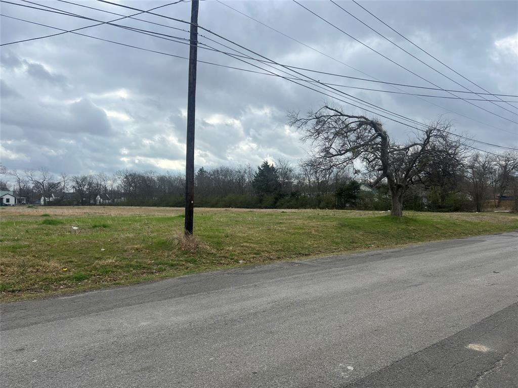 Tbd Albert Broadfoot Street Bonham, TX 75418 - Photo 2 of 7 a view of a street with a big yard