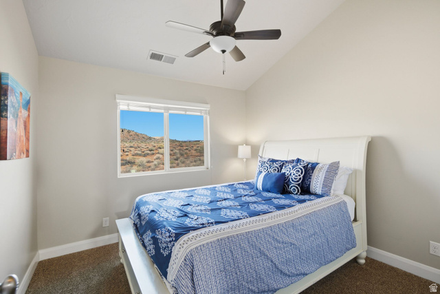 4269 Razor Drive Washington, UT 84780 - Photo 26 of 50 Carpeted bedroom with lofted ceiling and a ceiling fan