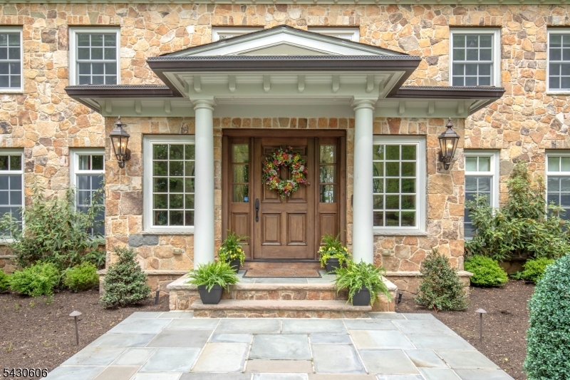 5 Burnett Road Mendham, NJ 07945 - Photo 4 of 50 a front view of a house with garden
