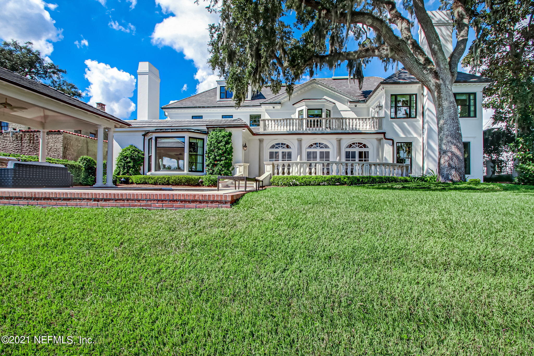 3955 Ortega Boulevard Jacksonville, FL 32210 - Photo 116 of 170 a front view of residential houses with yard and green space