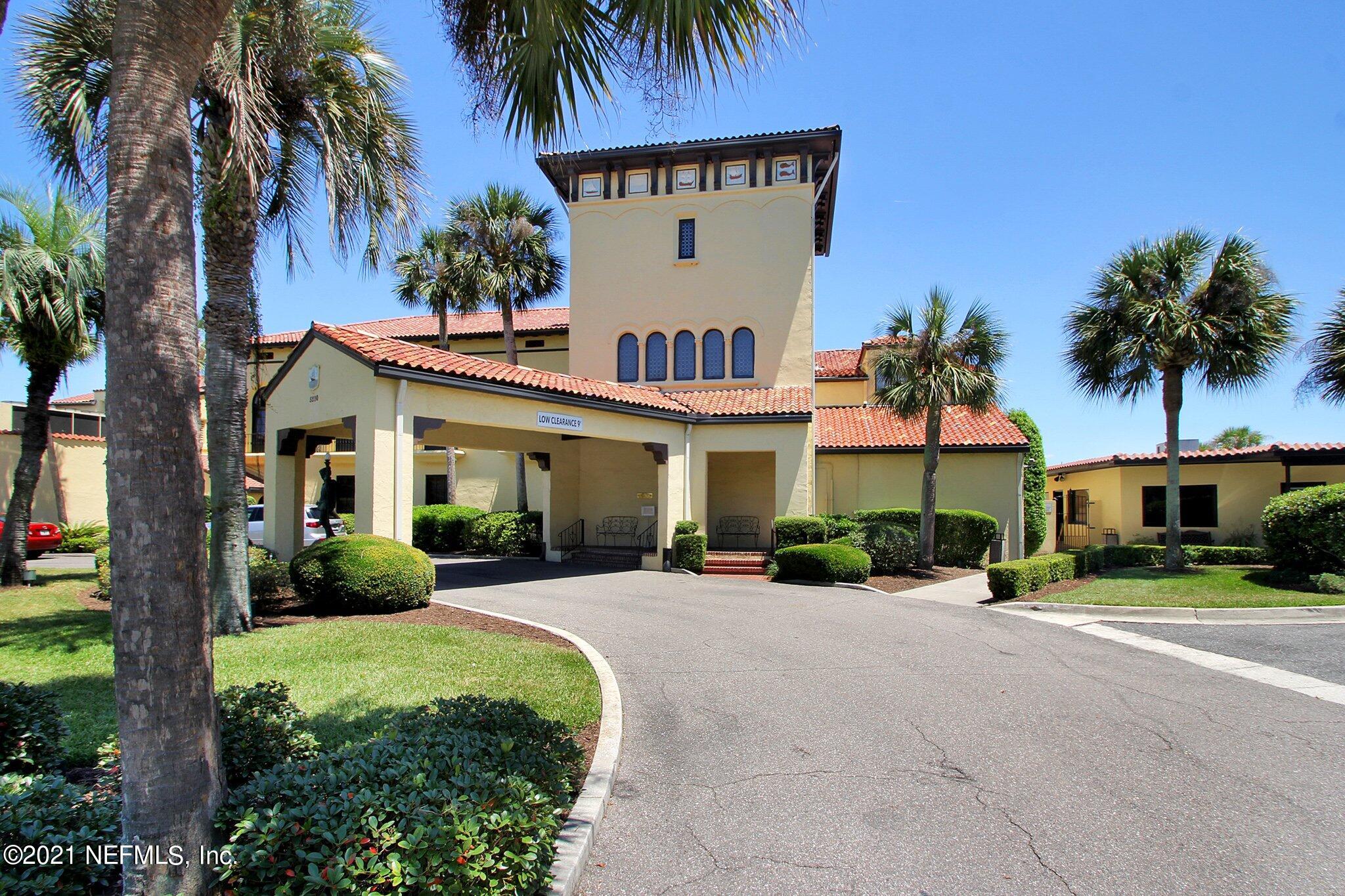 3955 Ortega Boulevard Jacksonville, FL 32210 - Photo 138 of 170 a front view of a house with garden and trees