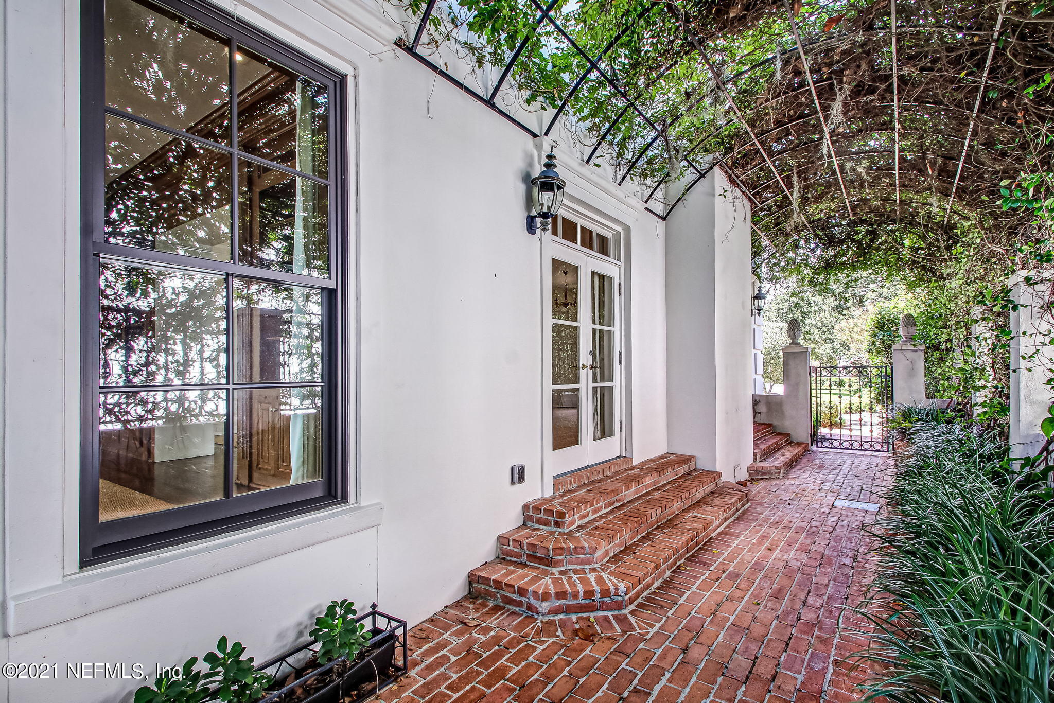 3955 Ortega Boulevard Jacksonville, FL 32210 - Photo 14 of 170 a front view of a house with a porch