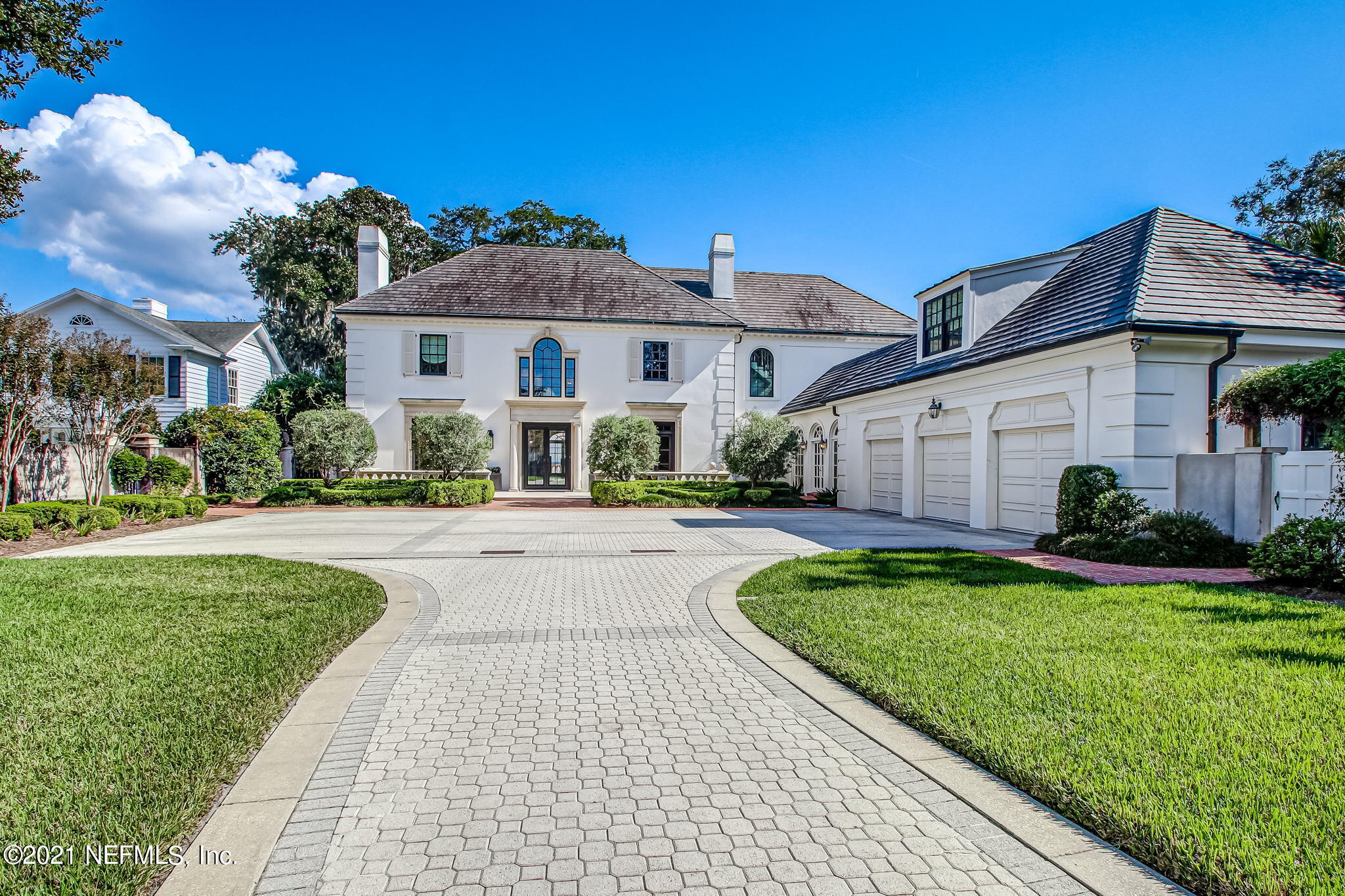 3955 Ortega Boulevard Jacksonville, FL 32210 - Photo 4 of 170 a front view of a house with yard patio and green space