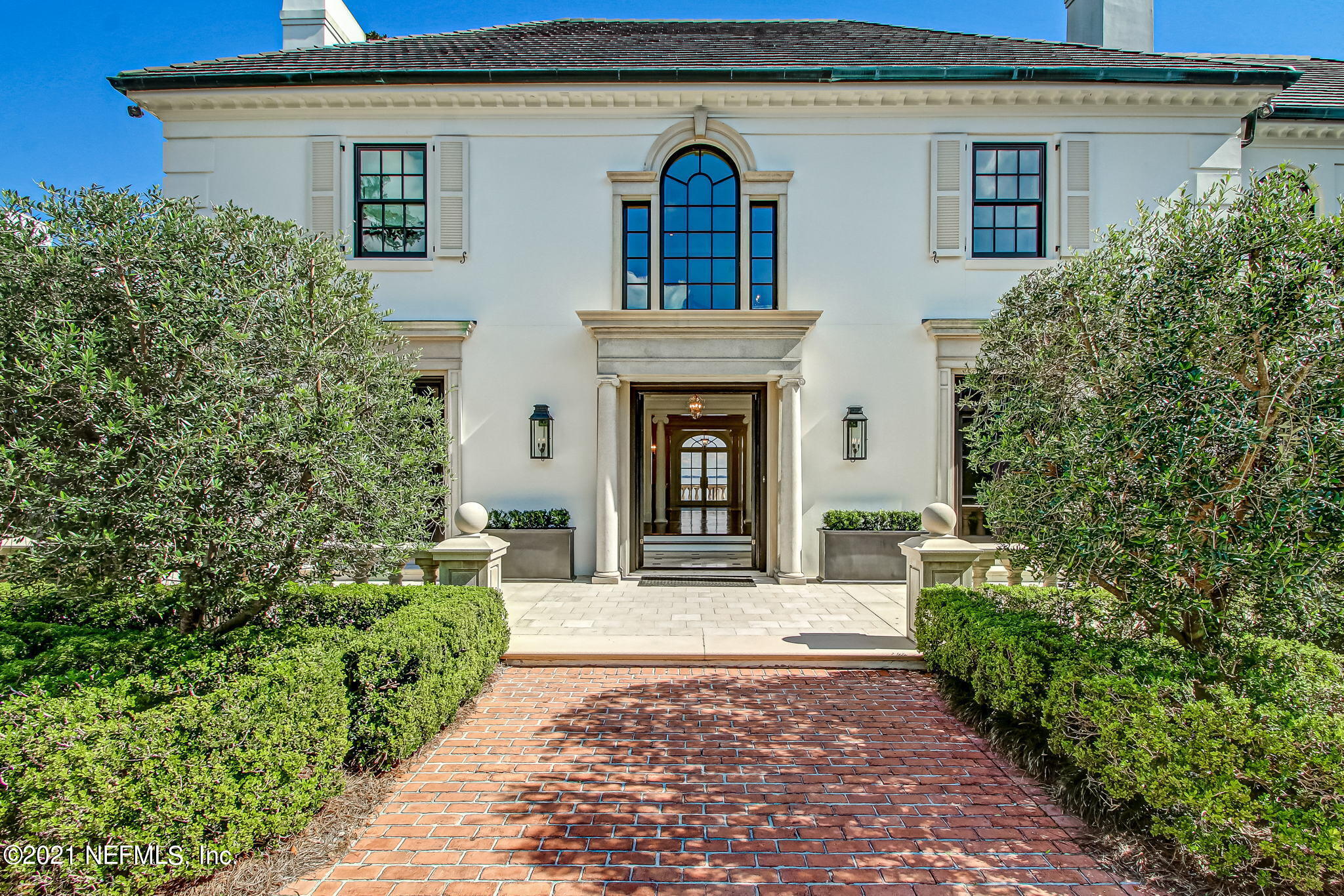 3955 Ortega Boulevard Jacksonville, FL 32210 - Photo 7 of 170 a view of a house with potted plants and a fountain