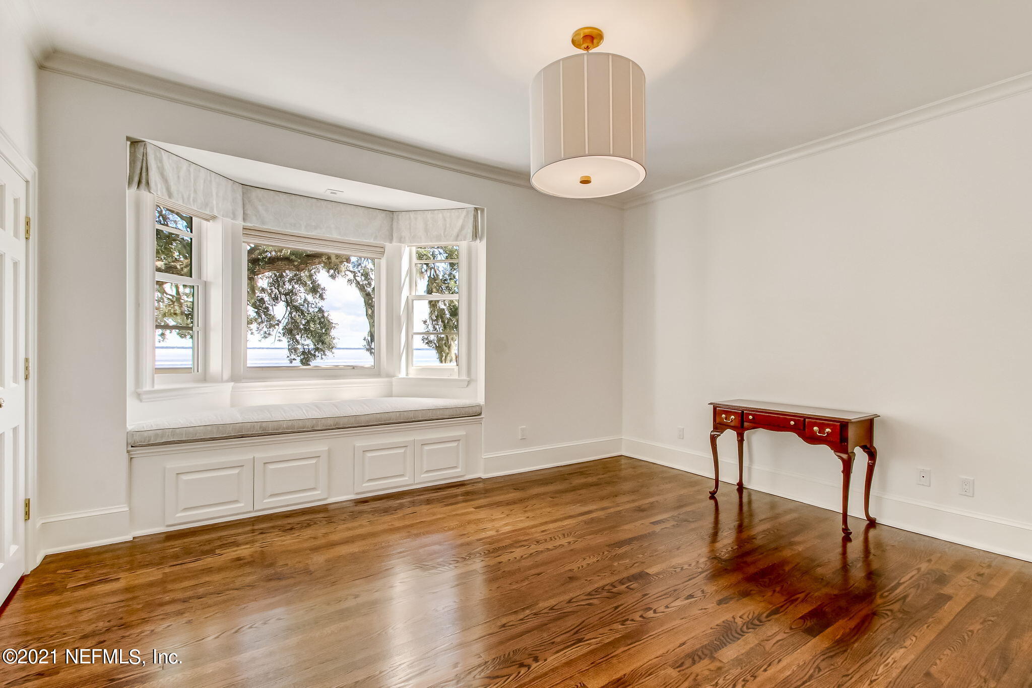 3955 Ortega Boulevard Jacksonville, FL 32210 - Photo 76 of 170 a view of a livingroom with wooden floor and a window