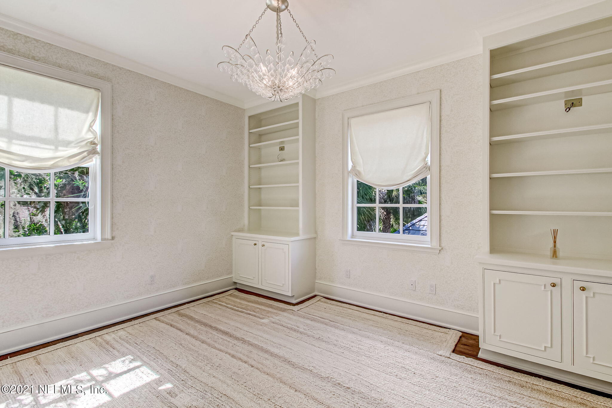 3955 Ortega Boulevard Jacksonville, FL 32210 - Photo 82 of 170 a view of empty room with wooden floor and fan