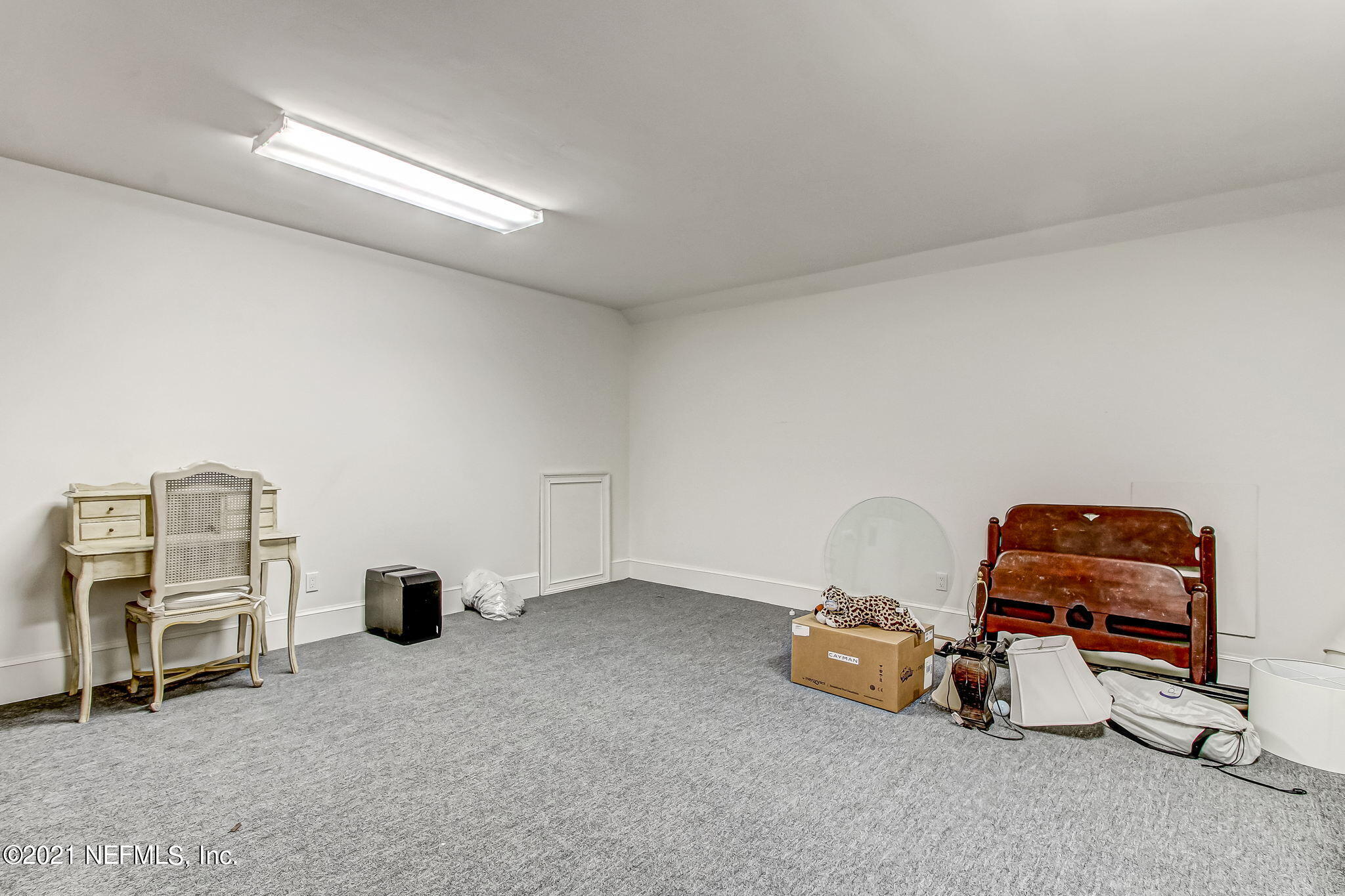 3955 Ortega Boulevard Jacksonville, FL 32210 - Photo 91 of 170 a room with a baby crib and a couch