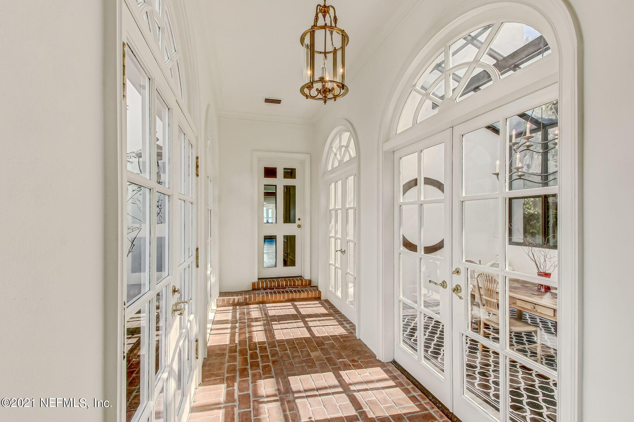 3955 Ortega Boulevard Jacksonville, FL 32210 - Photo 96 of 170 a view of a hallway with wooden floor and staircase