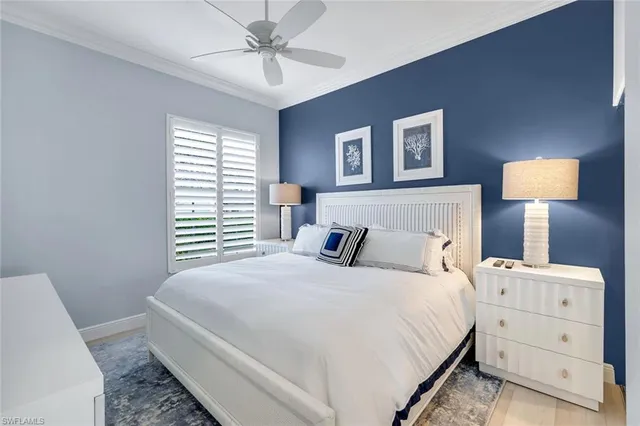 a bathroom with a sink mirror vanity and toilet