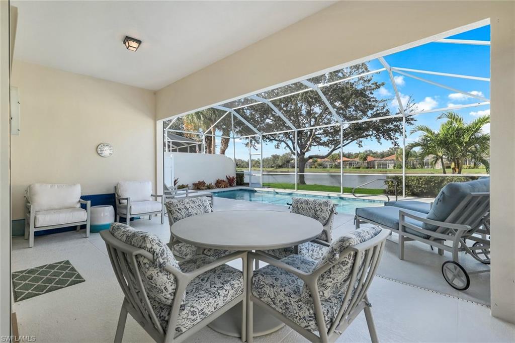 3787 Whidbey Way Naples, FL 34119 - Photo 28 of 50 a view of a patio with couches and chairs