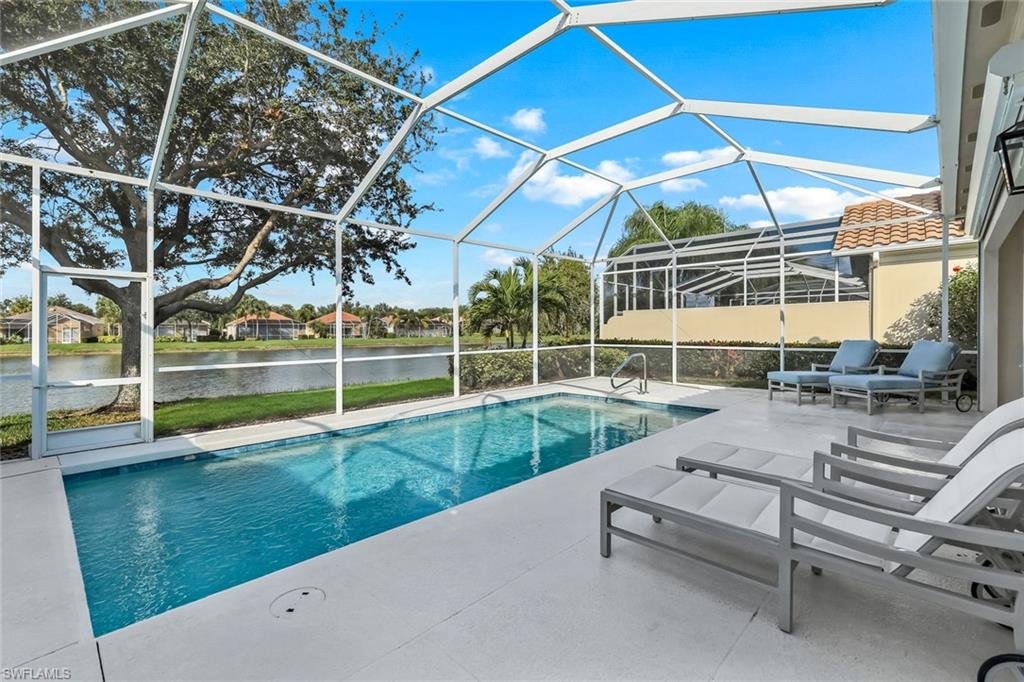 3787 Whidbey Way Naples, FL 34119 - Photo 30 of 50 a view of a backyard with sitting area