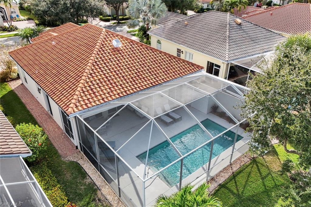 3787 Whidbey Way Naples, FL 34119 - Photo 36 of 50 a view of a house with a deck